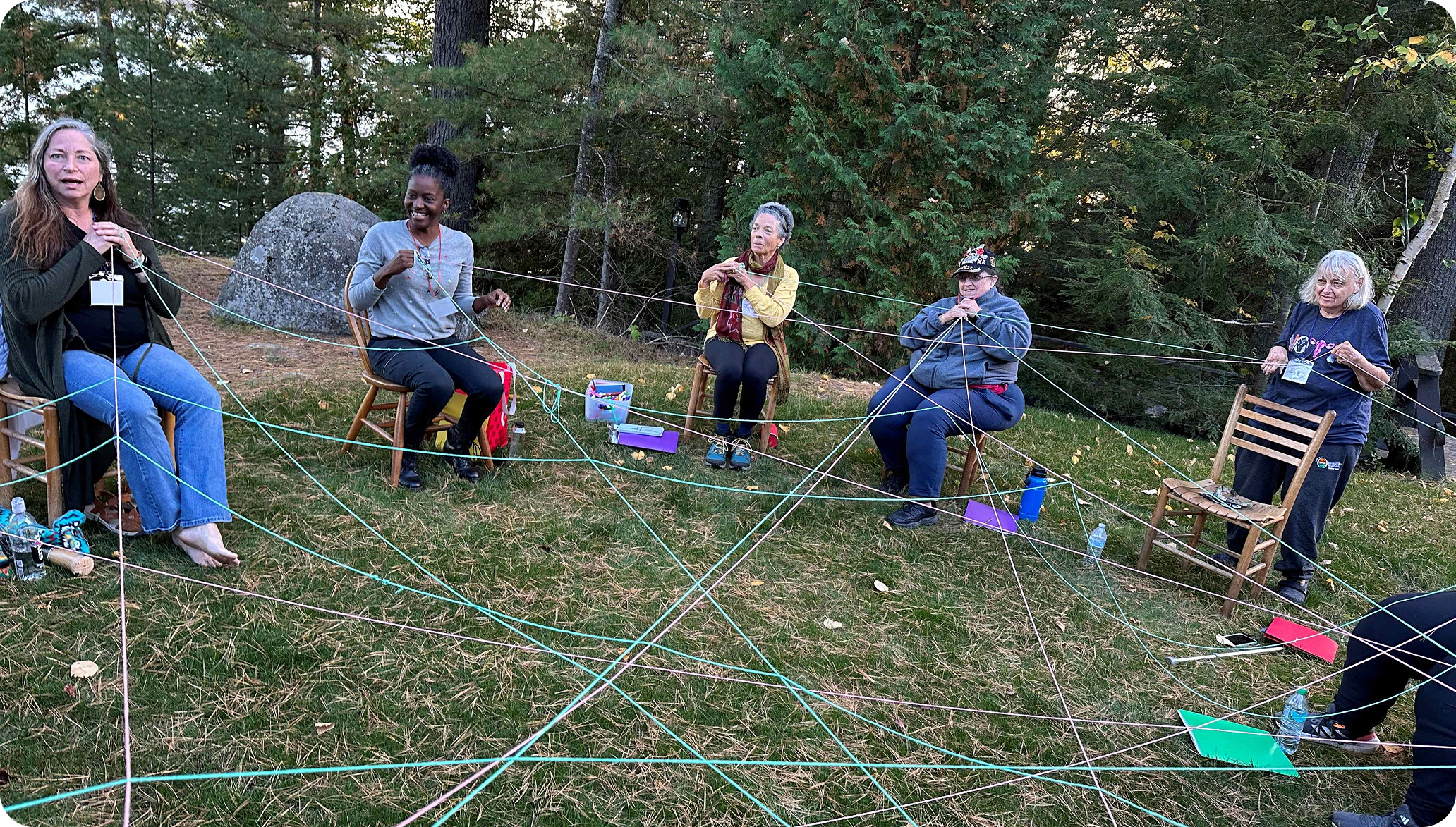 Woman in circle connected by string